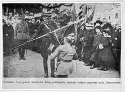 Commander of the 2nd Wielkopolska Rifle Division Colonel Jasiński gives the flag to Colonel Galecki